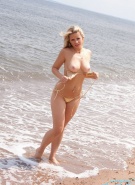 Ann Angel gold bikini on beach #9