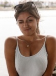 Ella Knox shows off her huge boobs in a figure hugging white dress while wearing no knickers