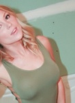 Madden is re modeling her bathroom in a tight green bodysuit as her nipples get hard.